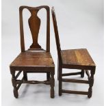 A pair of 18th century oak hall chairs, with vase shaped splats, solid seats and turned foot rails