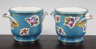 A pair of Minton Sevres style half bottle wine coolers, mid 19th century, each painted with floral