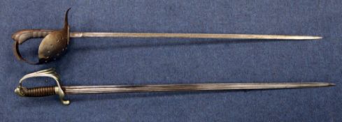 A 19th century French cavalry sword, the 30.75 inch fullered blade marked for Coulaux & Co,