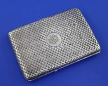 A late Victorian silver card purse, of rectangular form, with "scale" decoration and engraved