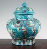 A Chinese Fahua decorated baluster jar and cover, 18th / 19th century, relief moulded with figures