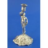 An early George III cast silver figural taperstick, modelled as a gentleman with raised arm