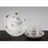 A Champions Bristol porcelain coffee cup and saucer and a similar saucer dish, c.1775, each
