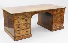 A Victorian burr walnut partner's pedestal desk, by Holland & Sons, with brown leather writing