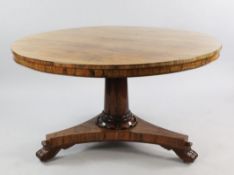 An early Victorian rosewood circular breakfast table, the central tapering column with tripartite