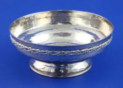 A George V Omar Ramsden silver bowl, the planished body with engraved inscription and applied