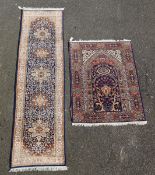 A Persian runner and rug, the latter decorated with vase of flowers, deer and birds, 8ft 10in by 4ft