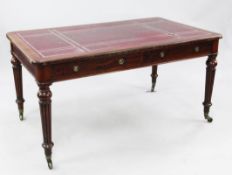 A Victorian mahogany partner's writing table, by Holland & Sons, with red leather skiver above