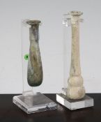 Two Roman glass unguentarium, c, 2nd century A.D., both with mineral iridescence, one with double