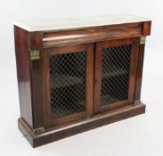 A Regency mahogany marble top side cabinet, with cushion frieze drawer above a pair of cupboard