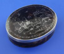 An 18th century tortoiseshell and silver pique oval table snuff box, with lid decorated with