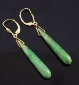 A pair of 9ct gold and jadeite drop earrings, of elongated pear shape, with ear clip attachments