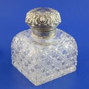 A large late Victorian repousse silver lidded cut glass inkwell, of square form, Horace Woodward &