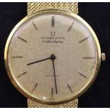 A gentleman's 18ct gold Swiss Universal Golden Shadow automatic wrist watch, with brushed yellow