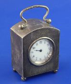 An Edwardian engine turned silver cased carriage timepiece by the Goldsmiths & Silversmiths Co