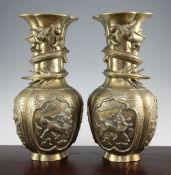 A pair of large Chinese bronze lobed baluster vases, early 20th century, each cast in high relief