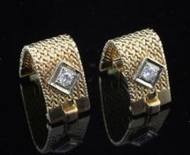 A pair of French 18ct gold and diamond set cufflinks, of domed loop form, with textured mesh links