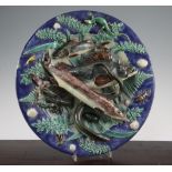 A Palissy style faience dish, late 19th century, modelled in high relief and openwork with fish,