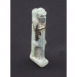 An Egyptian turquoise glazed faience amulet of Seth or Thoth, c.4th century B.C., 5cm, repaired