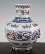 A Chinese doucai vase, 18th century, of archaistic form, finely painted to the central band with the