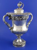 A William IV demi-fluted silver two handled presentation cup and cover by Matthew Boulton, of