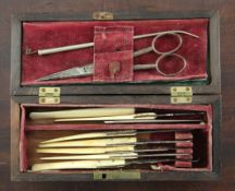 A 19th century rectangular calamander surgeon's box, with various bone and steel implements, 7.