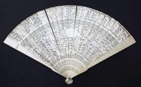 A Chinese export ivory brise fan, c.1900, the guards carved in relief with dragons, figures and