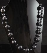 A single row banded agate bead necklace, with alternating small and large beads, 24in.