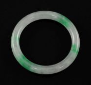 A Chinese ice white and emerald green jadeite bangle, 7.4cm.