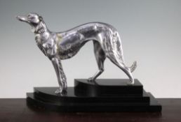 A French Art Deco silvered metal model of a Borzoi, on a stepped marble base marked Rochard, 16in.