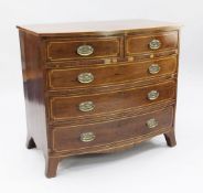 A 19th century mahogany and boxwood lined inlaid bowfront chest, of two short and three long