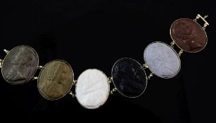 An 18ct gold mounted lava bracelet, set with six different coloured oval panels carved with the