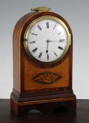 A Regency inlaid mahogany mantel timepiece with circular Roman dial and verge watch movement