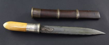 A Burmese dagger or dha, with part floral scrolled inlaid 8 inch blade, with ivory handle, silver