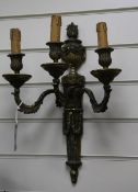 A pair of Louis XVI style ormolu wall lights, each with three scrolling arms and circular sconces,