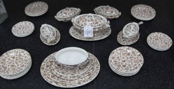 A Ridgway Chintz pattern doll's dinner service, c.1900, transfer printed in brown with an Indian