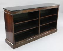 A 19th century rosewood open bookcase, with marbled top and four adjustable shelves, on plinth base,