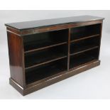 A 19th century rosewood open bookcase, with marbled top and four adjustable shelves, on plinth base,