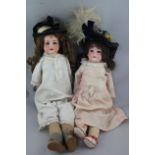 An Armand Marseille bisque headed doll, 370, with impressed marks AM and 3 DEP, with soft body and