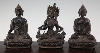 Three A Sino-Tibetan bronze seated figures of Buddhist deities, depicting Amitabha, Akshobhya and