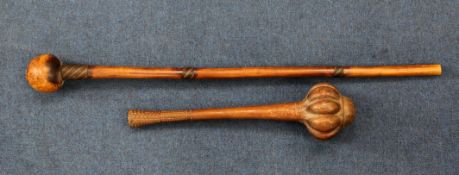 A Fijian hardwood Ula or throwing club, with lobed head, with incised zig zag grip, 16.25in.,