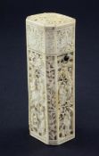 A Chinese export ivory etui case, c.1800, of canted rectangular section, carved in high relief