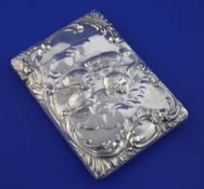 An Edwardian silver card case, of rectangular form, with engraved armorials and initials and