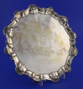 An early George III silver salver by Ebenezer Coker, of shaped circular form, with shell scroll