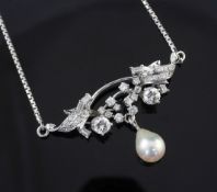 A white gold, diamond and cultured pearl drop pendant necklace, set with round and baguette cut