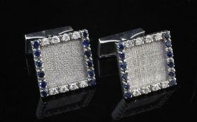 A pair of French 18ct white gold, sapphire and diamond cufflinks, of square form, with textured