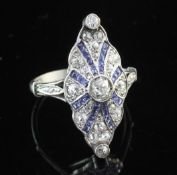 A 1930's Art Deco platinum, sapphire and diamond ring, of shaped marquise form, set with old cut