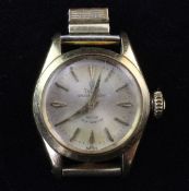 A lady's 18ct gold Tudor Oyster Princess automatic wrist watch, with baton numerals, no strap.