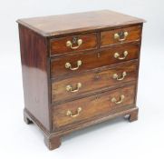 A George III mahogany chest, of two short and three long graduated drawers, on bracket feet, W.2ft