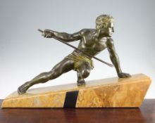 A French Art Deco patinated metal model of a hunter, on a sloping marble base marked Uriano, 28.